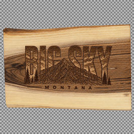 Black walnut cutting board engraved with Big Sky Montana heritage artwork