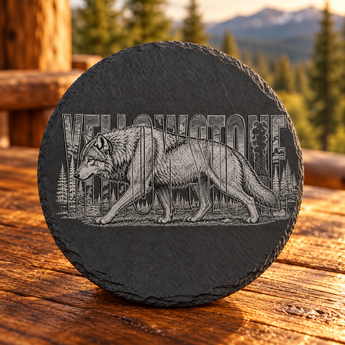 Gray Wolf Slate Coaster — lifestyle view of the engraved black slate coaster on a Montana cabin table.