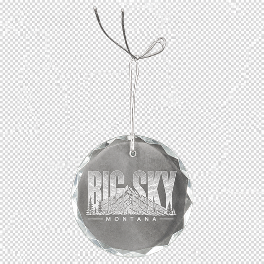 Clear faceted crystal ornament engraved with Big Sky Montana artwork