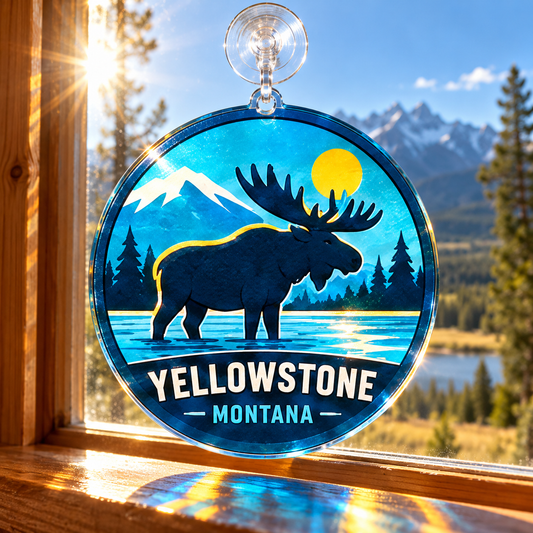 Yellowstone moose acrylic suncatcher hanging in a sunny cabin window