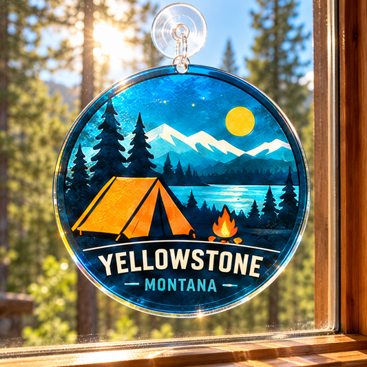 Yellowstone Camping acrylic suncatcher hanging in a sunny Montana window