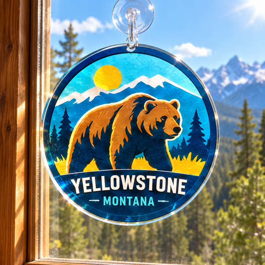 Yellowstone grizzly bear acrylic suncatcher in a sunny cabin window