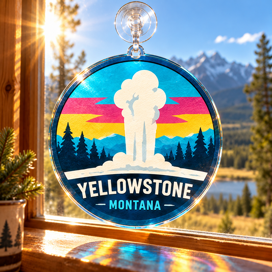 Yellowstone Old Faithful acrylic suncatcher hanging in a sunny cabin window
