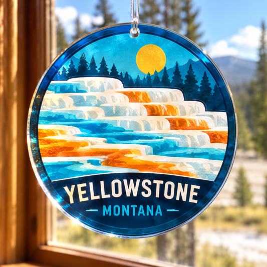 Yellowstone Mammoth Hot Springs acrylic suncatcher in a sunny cabin window