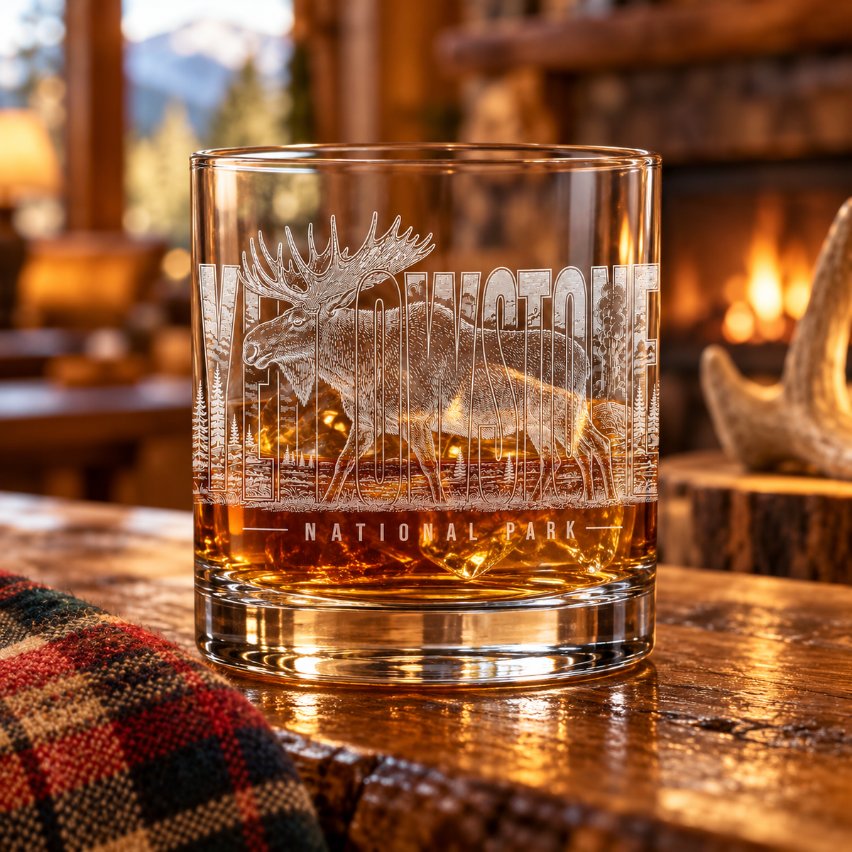 Yellowstone National Park Moose Rocks Glass — lifestyle photo with whiskey at a Yellowstone lodge.