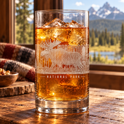 Yellowstone National Park Moose Highball Glass — lifestyle photo with an iced amber drink.