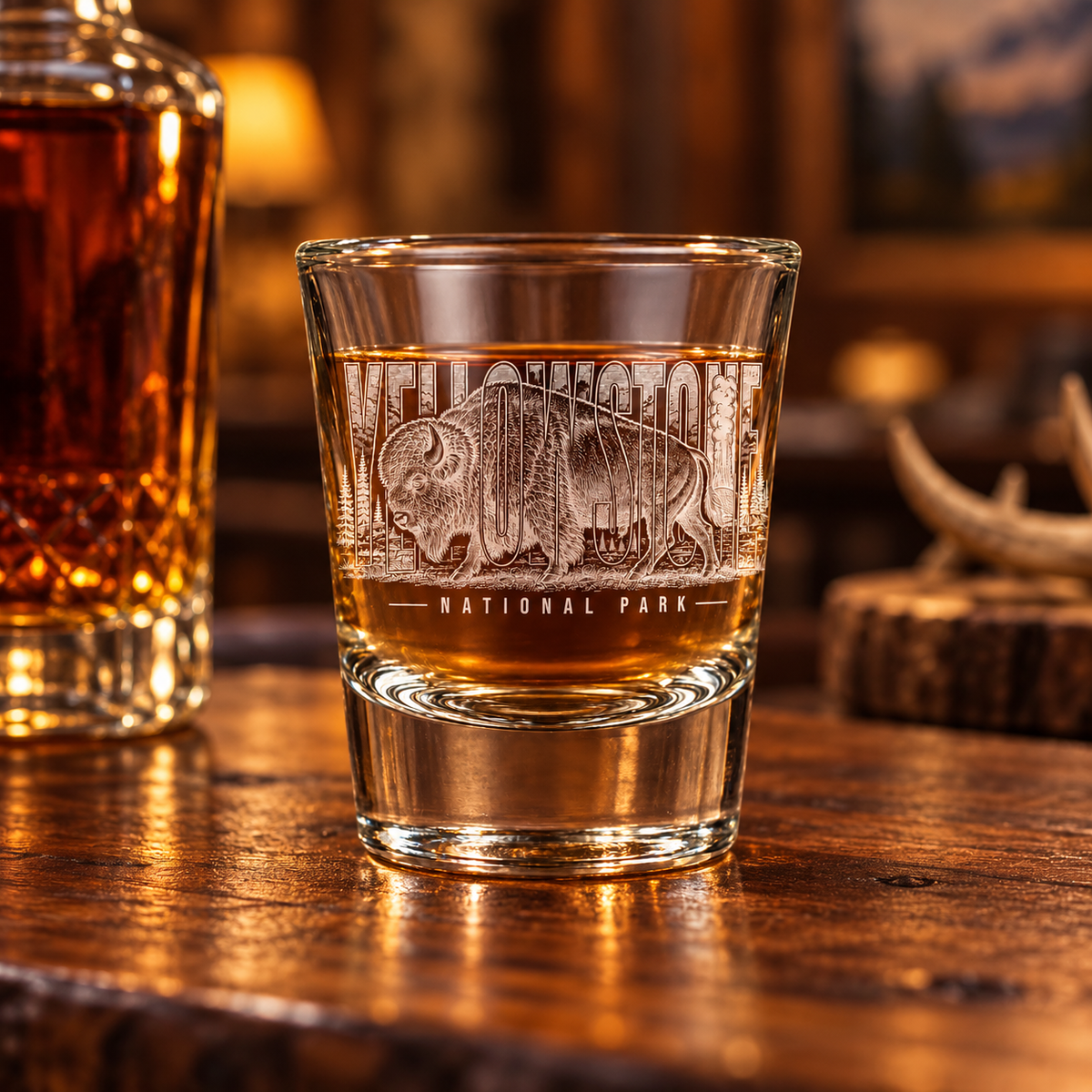 Yellowstone National Park Bison Shot Glass — lifestyle photo on a lodge bar.