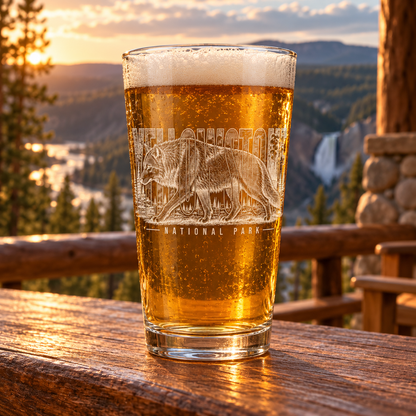 Yellowstone National Park Wolf Beer Pint — lifestyle photo with beer on a scenic lodge deck.