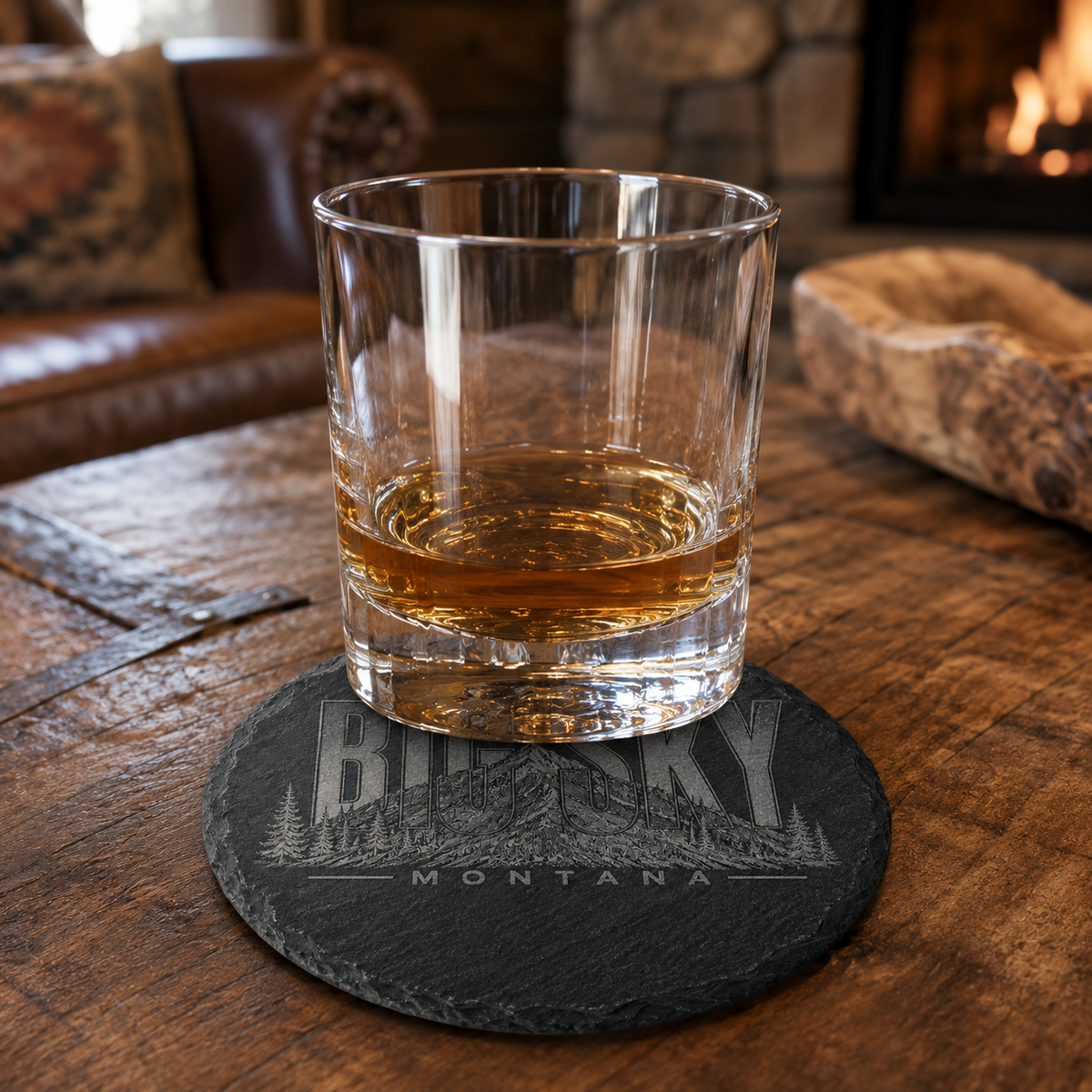 Big Sky Heritage round slate coaster at a Big Sky lodge