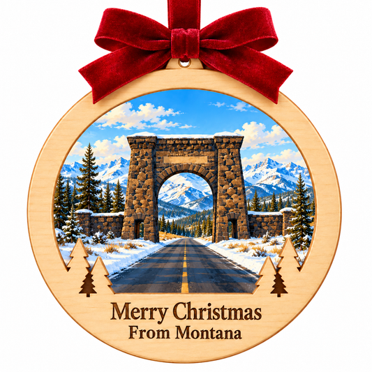 Yellowstone Entrance Light-Up Ornament with locked wood frame, red bow, and Merry Christmas From Montana plaque